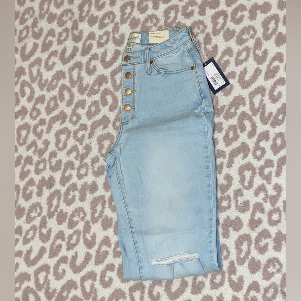Brand new jeans with tags I have size 2, 4, 10